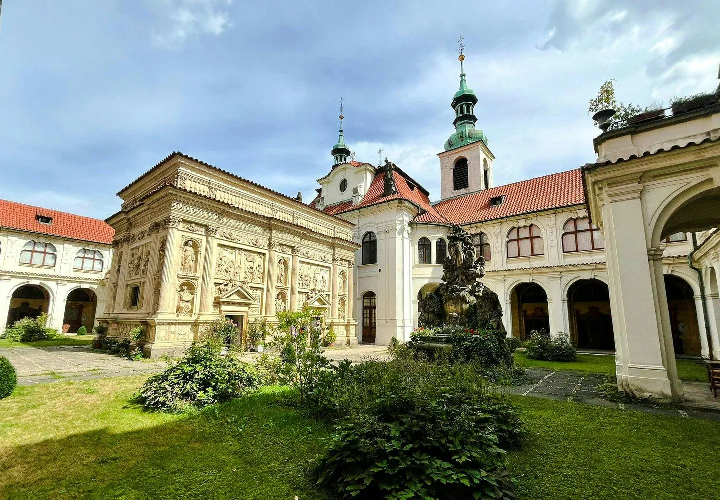 Courtyard garden and church buildings at Prague Loreto