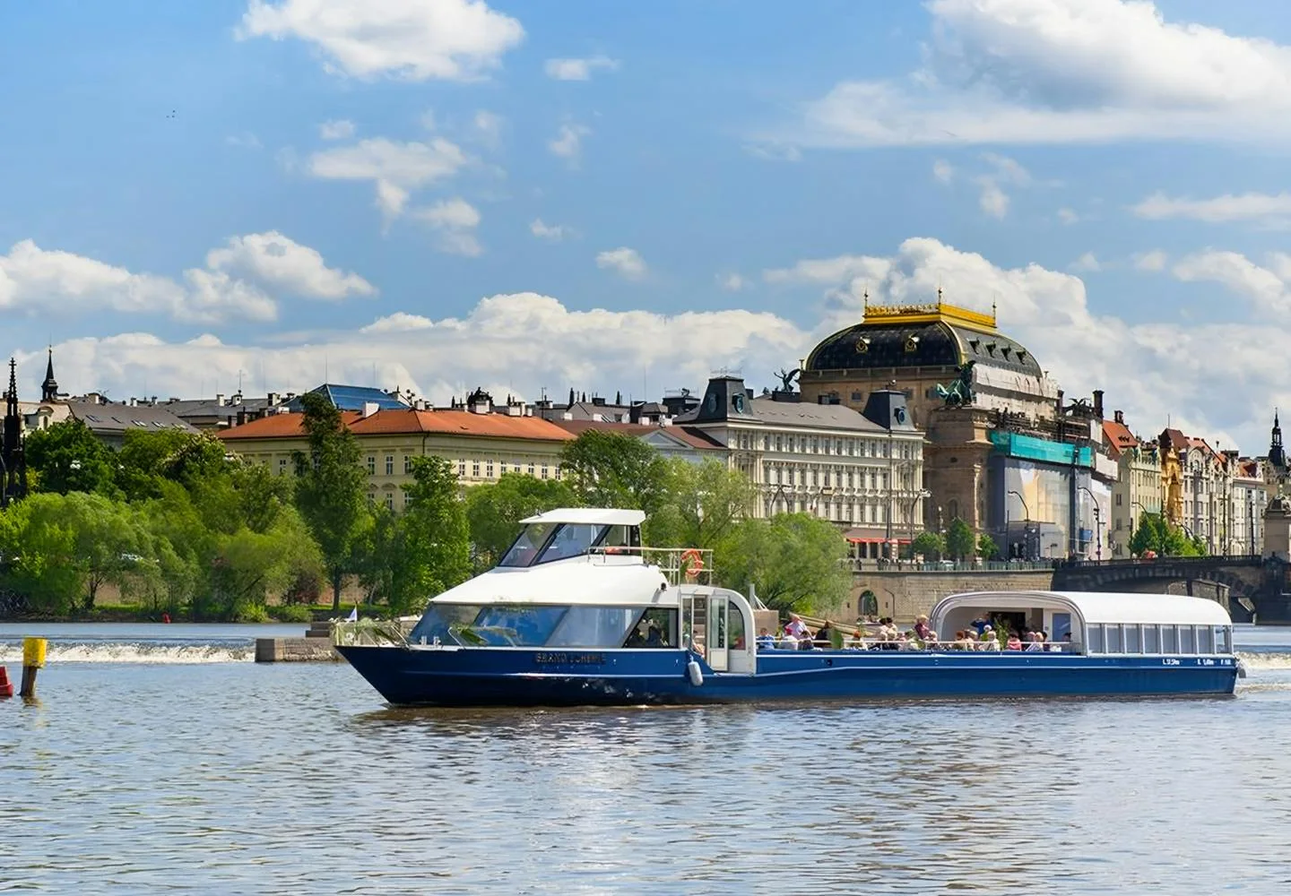 Glass-roofed sightseeing boat on the Vltava