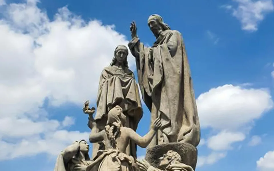 Stone figures on a historic Prague monument