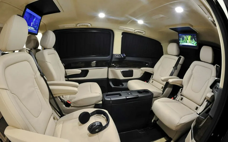 Passenger seats inside a private transfer vehicle