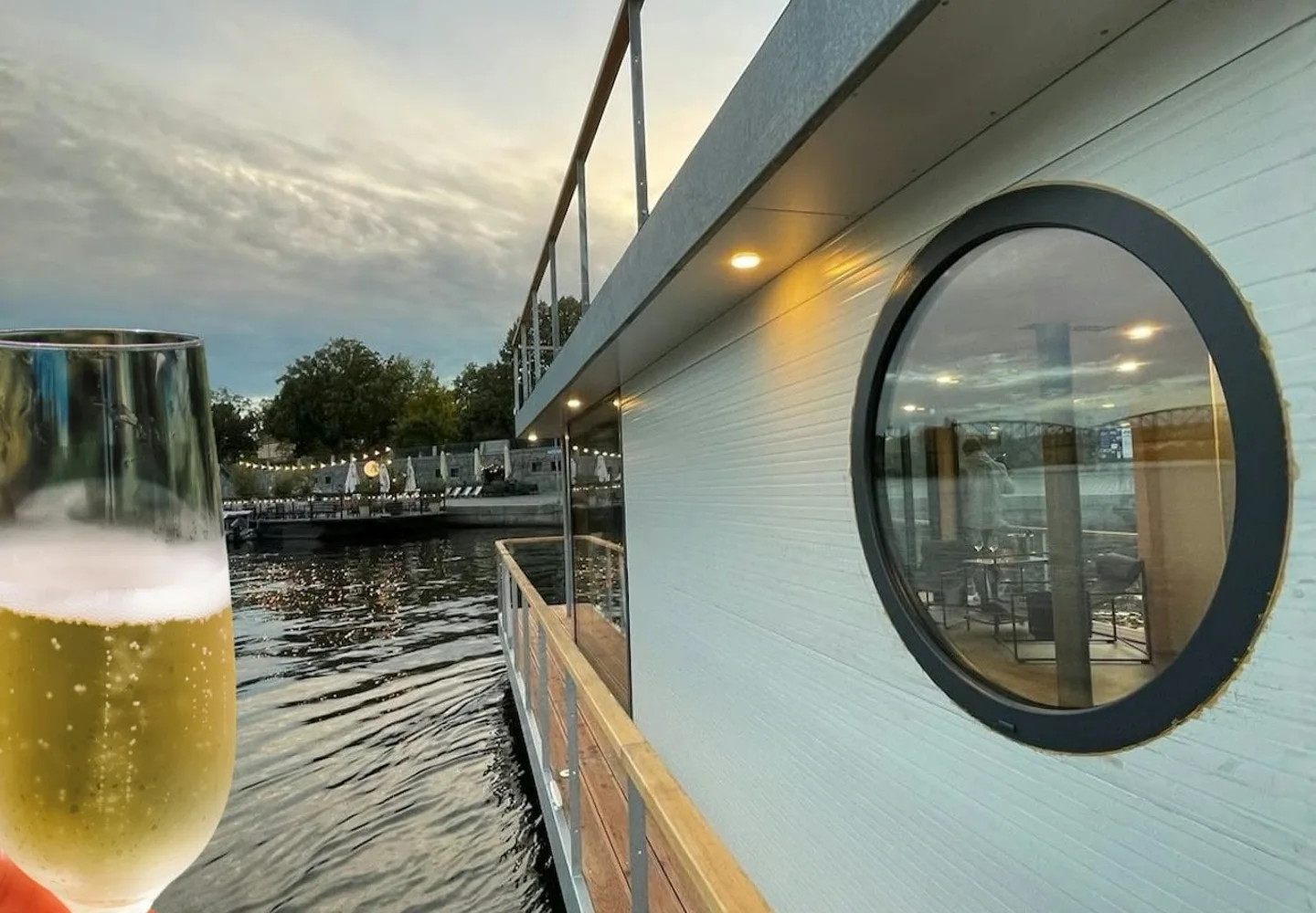Drink beside the window of a small river boat