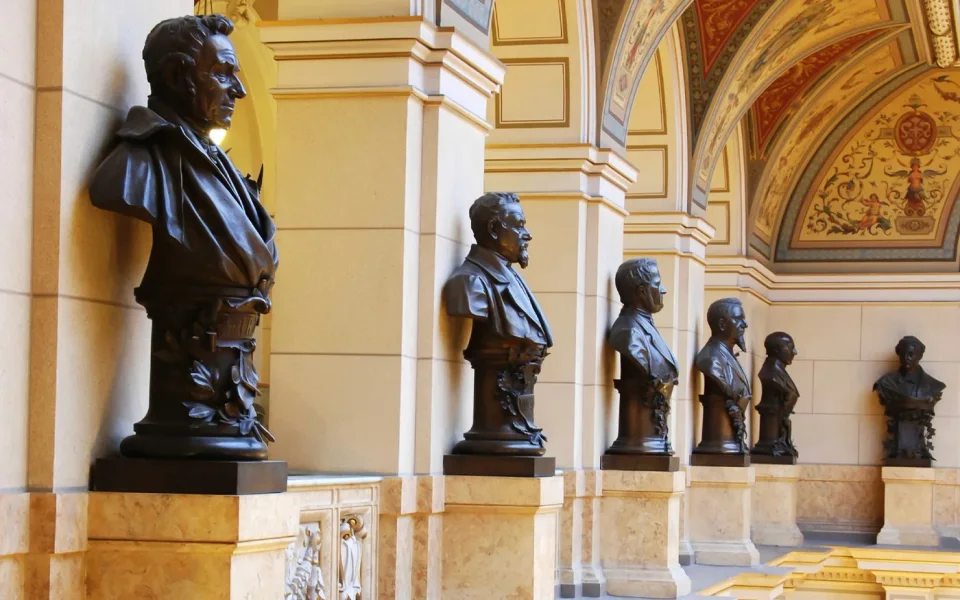 Sculpted busts along a gallery at the National Museum